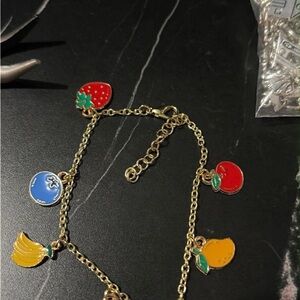 Gold-Tone Fruit Charm Bracelet with Red, Blue, Yellow & Orange Enamel Charms